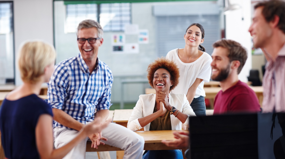 Employees talking and laughing