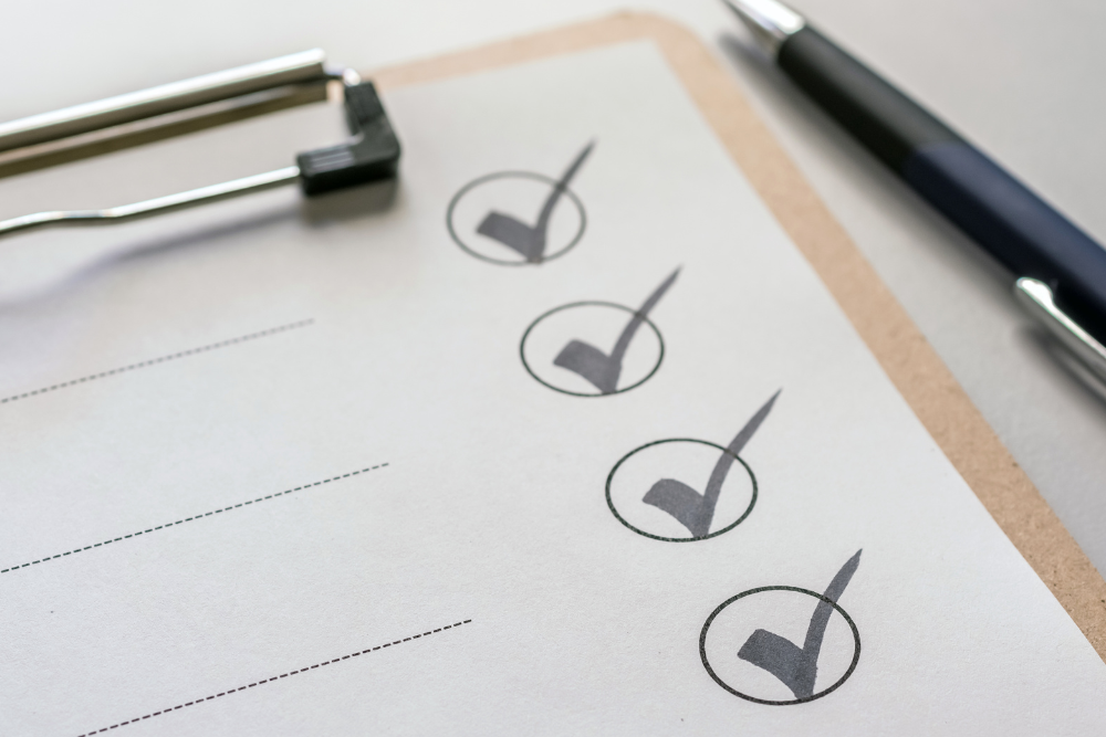 Checklist and pen on a table