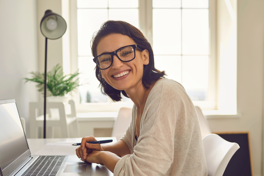 A woman with her laptop working from home