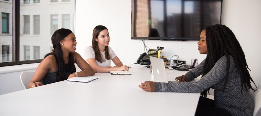 Group of HR Employees having a team meeting in a modern office